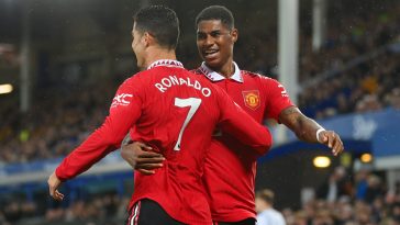 Cristiano Ronaldo of Manchester United celebrates scoring the winning goal to make it 2-1 with Marcus Rashford during the Premier League match between Everton FC and Manchester United at Goodison Park on October 09, 2022 in Liverpool, England.