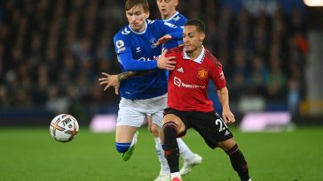 James Garner of Everton battles for possession with Antony of Manchester United during the Premier League match between Everton FC and Manchester United at Goodison Park on October 09, 2022 in Liverpool, England.