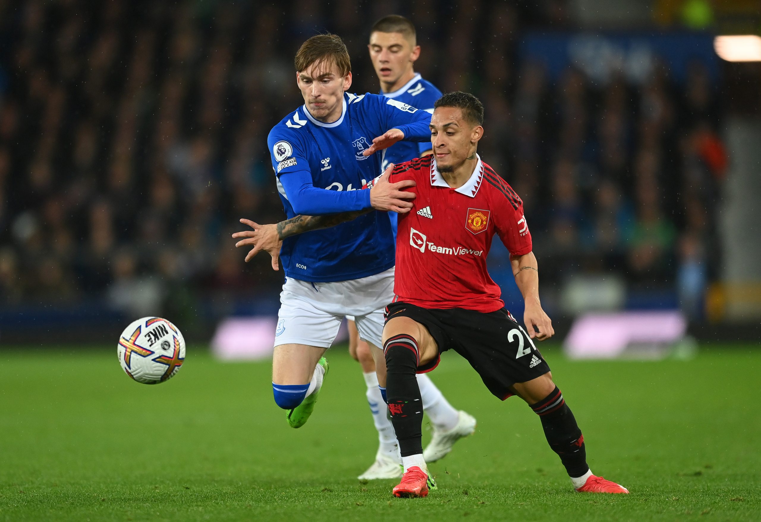 James Garner of Everton battles for possession with Antony of Manchester United during the Premier League match between Everton FC and Manchester United at Goodison Park on October 09, 2022 in Liverpool, England.