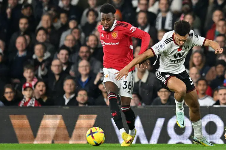 Manchester United's Swedish striker Anthony Elanga (L) vies with Fulham's English-born US defender Antonee Robinson (R) during the English Premier League football match between Fulham and Manchester United at Craven Cottage in London on November 13, 2022