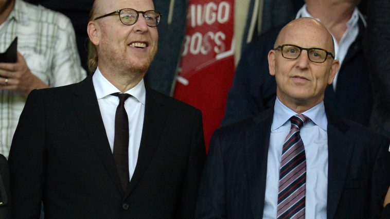 Manchester United's US co-chairmen Joel Glazer (R) and Avram Glazer (L) attend the English Premier League football match between Manchester United and Southampton at Old Trafford in Manchester, north west England, on August 19, 2016