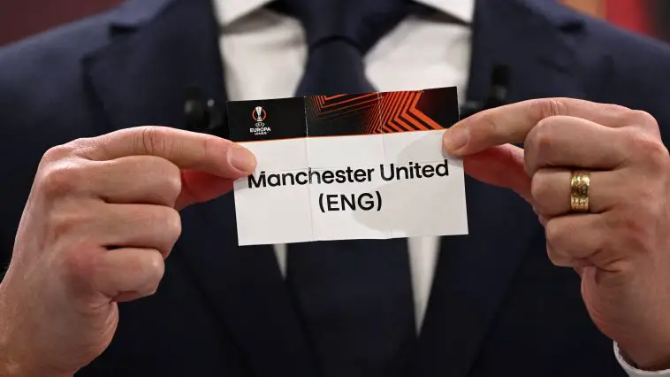 Europa League ambassador Hungarian former footballer Zoltan Gera shows the paper slip of Manchester United during the draw for the round of 16 of the 2022-2023 UEFA Europa League football tournament in Nyon on November 7, 2022