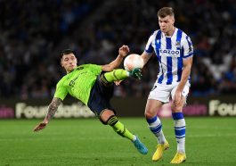 Manchester United's Argentinian defender Lisandro Martinez (L) vies with Real Sociedad's Norwegian forward Alexander Sorloth during the UEFA Europa League 1st round group E football match between Real Sociedad and Manchester United at the Anoeta stadium in San Sebastian, on November 3, 2022