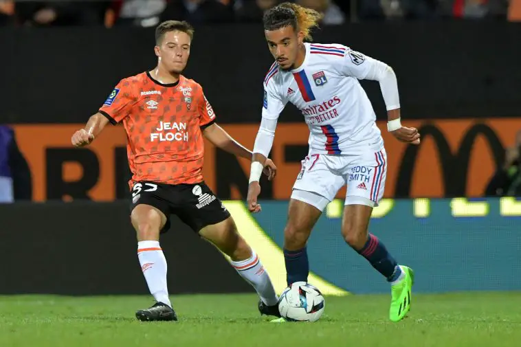 Lorient's French midfielder Theo Le Bris (L) vies with Lyon's French defender Malo Gusto (R) during the French L1 football match between Lorient and Lyon (OL) at the Stade du Moustoir in Lorient, on September 7, 2022.