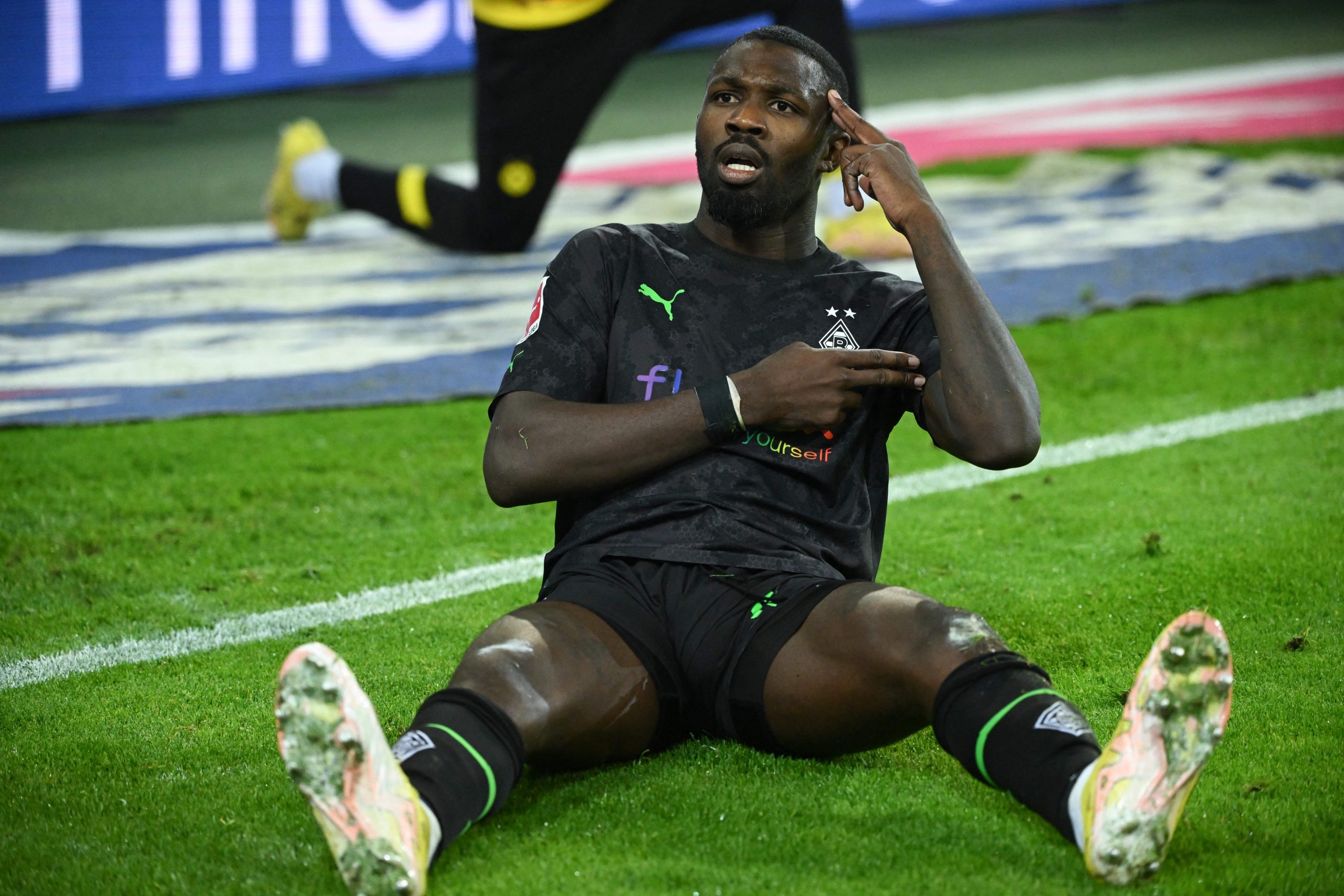 Moenchengladbach's French forward Marcus Thuram celebrates after scoring a goal during the German first division Bundesliga football match between Borussia Moenchengladbach v Borussia Dortmund in Moenchengladbach, western Germany, on November 11, 2022.