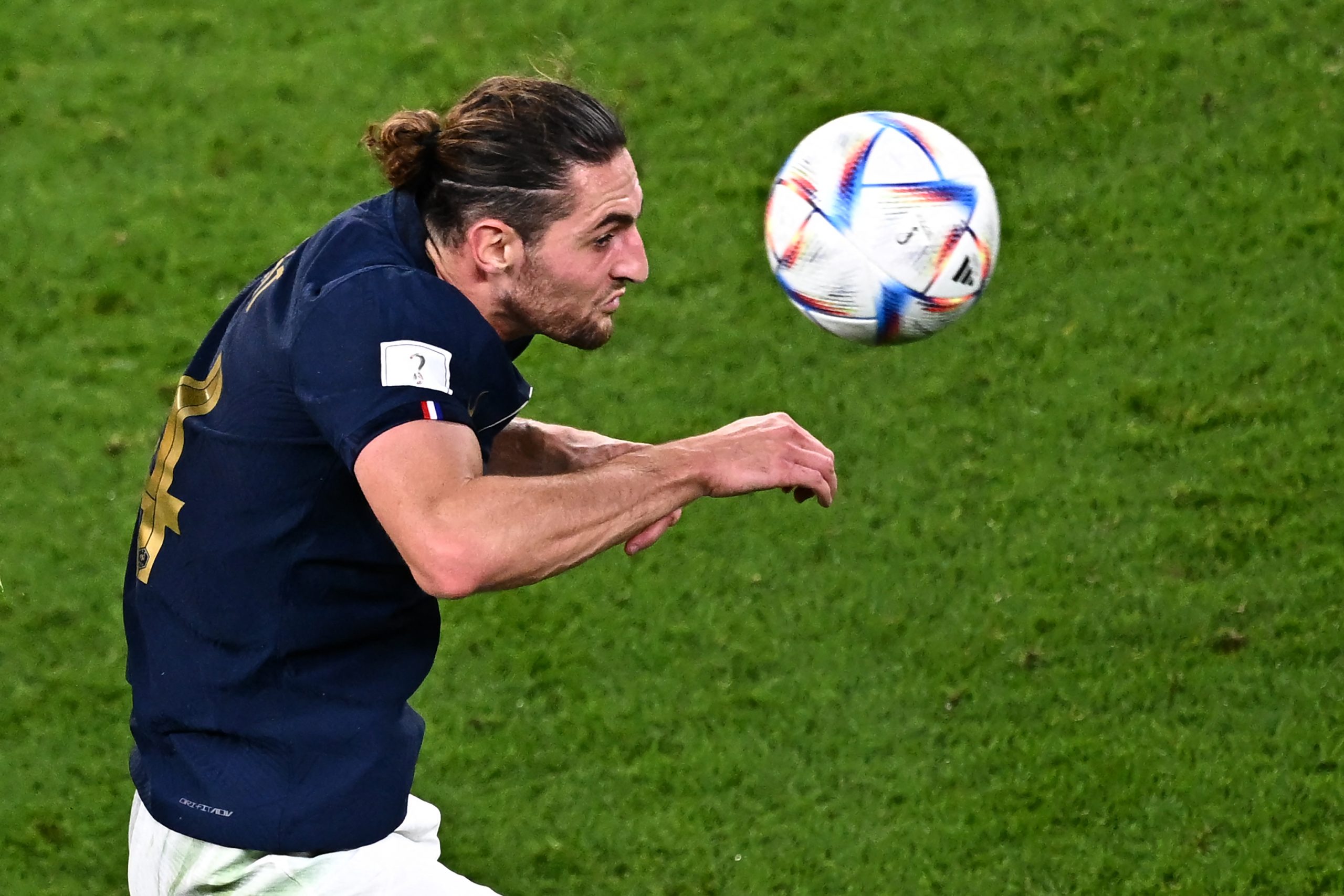 France's midfielder #14 Adrien Rabiot heads the ball during the Qatar 2022 World Cup Group D football match between France and Australia at the Al-Janoub Stadium in Al-Wakrah, south of Doha on November 22, 2022