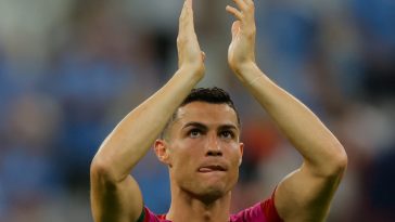 Portugal's forward #07 Cristiano Ronaldo applauds supporters after his team won the Qatar 2022 World Cup Group H football match between Portugal and Uruguay at the Lusail Stadium in Lusail, north of Doha on November 28, 2022