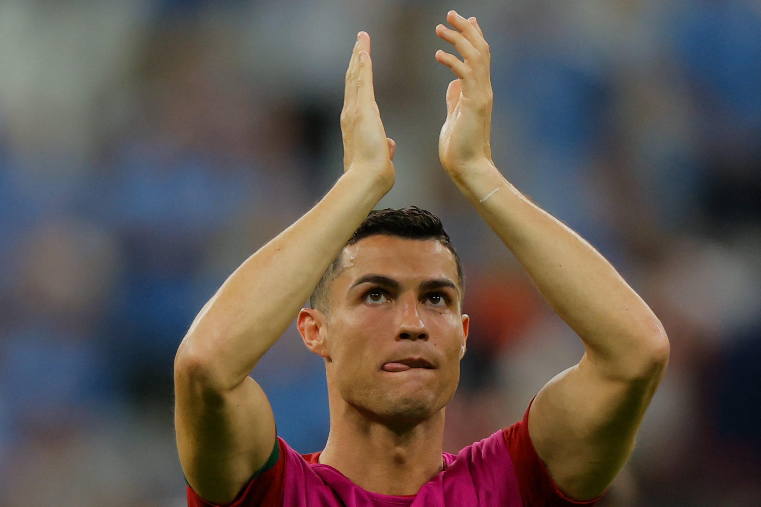 Portugal's forward #07 Cristiano Ronaldo applauds supporters after his team won the Qatar 2022 World Cup Group H football match between Portugal and Uruguay at the Lusail Stadium in Lusail, north of Doha on November 28, 2022