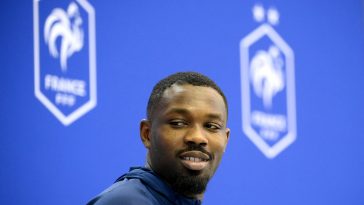France's forward Marcus Thuram arrives for a press conference at the Jassim-bin-Hamad Stadium in Doha on November 24 , 2022, during the Qatar 2022 World Cup football tournament