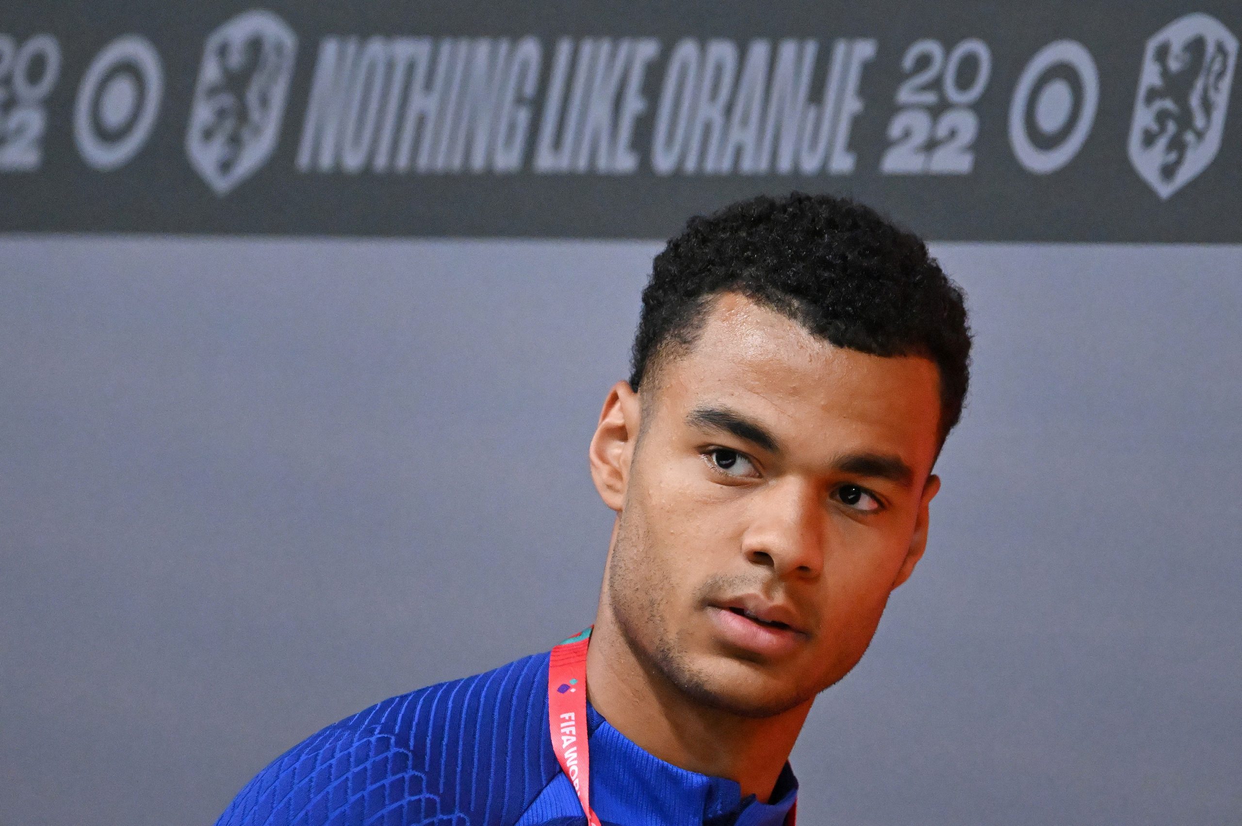 Netherland's forward Cody Gakpo arrives to attend a press conference at the Qatar University training site, in Doha, on November 27, 2022 during the Qatar 2022 World Cup football tournament