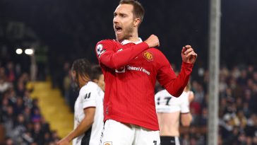 Christian Eriksen of Manchester United celebrates after scoring their team's first goal during the Premier League match between Fulham FC and Manchester United at Craven Cottage on November 13, 2022 in London, England.