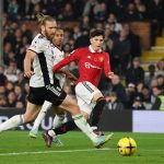 Alejandro Garnacho of Manchester United scores their side's second goal as Bernd Leno of Fulham attempts to make a save during the Premier League match between Fulham FC and Manchester United at Craven Cottage on November 13, 2022 in London, England.