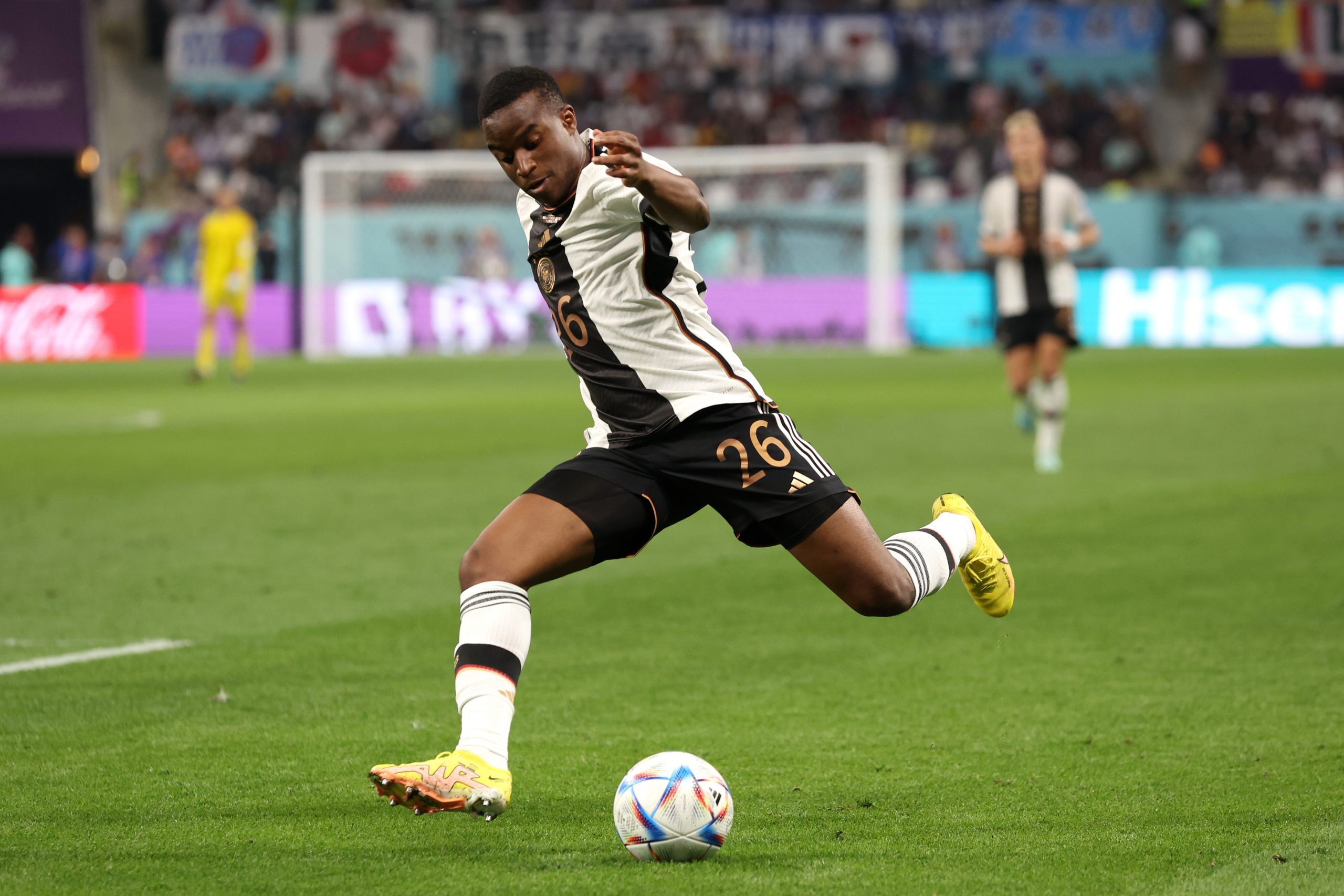 Youssoufa Moukoko of Germany makes a pass during the FIFA World Cup Qatar 2022 Group E match between Germany and Japan at Khalifa International Stadium on November 23, 2022 in Doha, Qatar