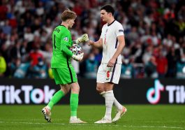 Harry Maguire of England interacts with Jordan Pickford of England during the penalty shoot out during the UEFA Euro 2020 Championship Final between Italy and England at Wembley Stadium on July 11, 2021 in London, England.