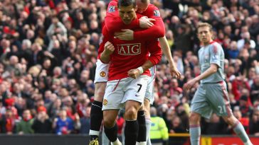 Cristiano Ronaldo of Manchester United celebrates with team mate Wayne Rooney after scoring the opening goal from the penalty spot during the Barclays Premier League match between Manchester United and Liverpool at Old Trafford on March 14, 2009 in Manchester, England.