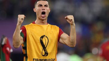 Cristiano Ronaldo of Portugal celebrates in front of the spectators after the final whistle during the FIFA World Cup Qatar 2022 Group H match between Portugal and Ghana at Stadium 974 on November 24, 2022 in Doha, Qatar