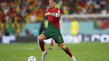 Cristiano Ronaldo of Portugal runs with the ball during the FIFA World Cup Qatar 2022 Group H match between Portugal and Ghana at Stadium 974 on November 24, 2022 in Doha, Qatar.