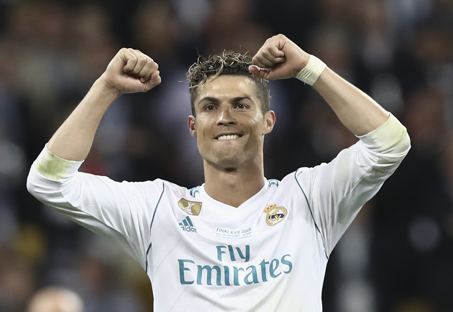 Real Madrid's Portuguese forward Cristiano Ronaldo celebrates after winning the UEFA Champions League final football match between Liverpool and Real Madrid at the Olympic Stadium in Kiev, Ukraine on May 26, 2018