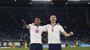 Jude Bellingham and Declan Rice of England celebrate after victory in the UEFA Euro 2020 Championship Quarter-final match between Ukraine and England at Olimpico Stadium on July 03, 2021 in Rome, Italy.