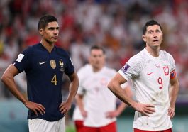 Raphael Varane and Robert Lewandowski during France vs Poland. (Photo by KIRILL KUDRYAVTSEV/AFP via Getty Images)