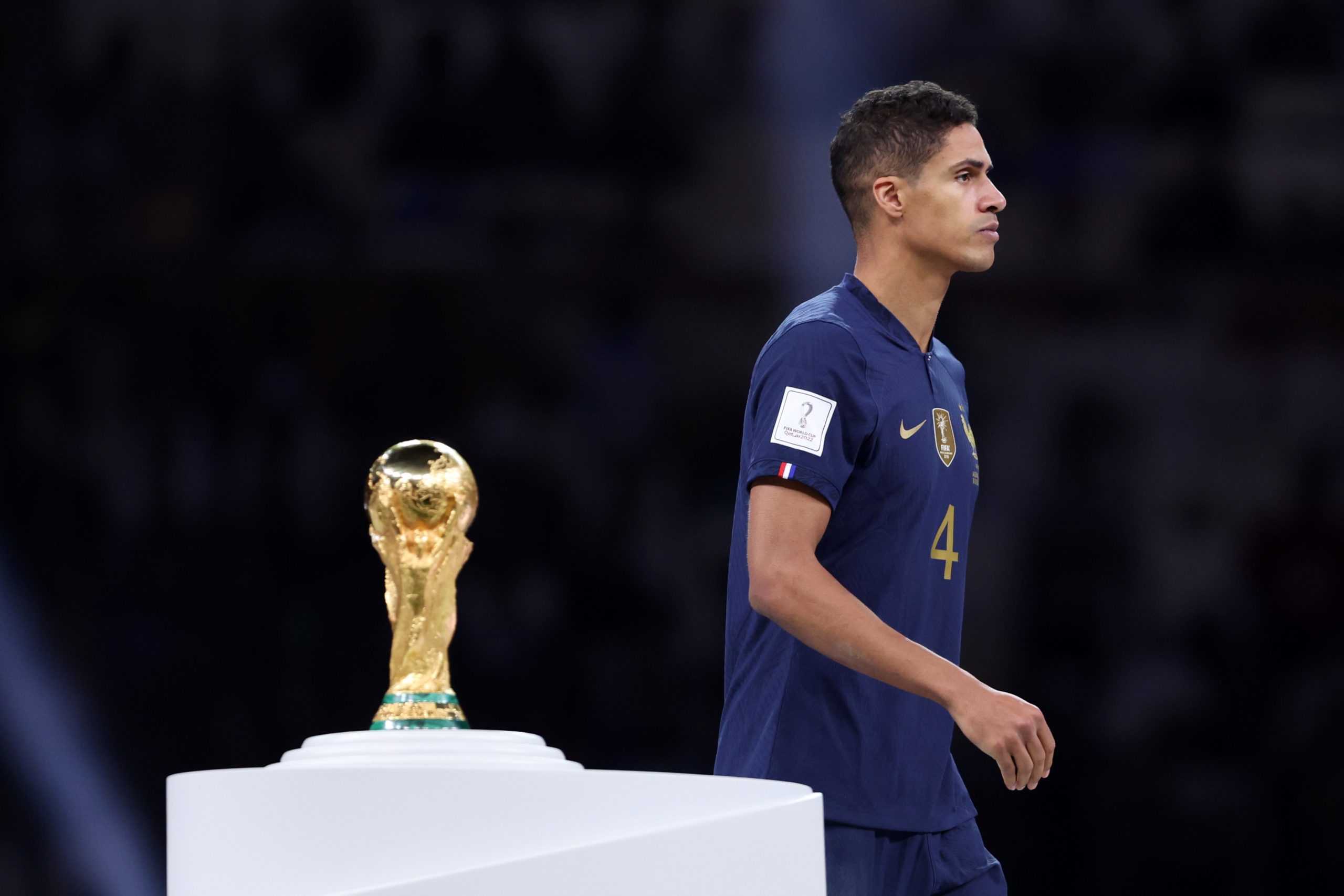 Raphael Varane of France walks past the FIFA World Cup.