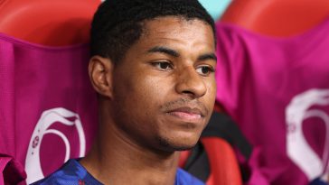 Marcus Rashford of England looks on from the subs bench during the FIFA World Cup Qatar 2022 Round of 16 match between England and Senegal at Al Bayt Stadium on December 04, 2022 in Al Khor, Qatar.