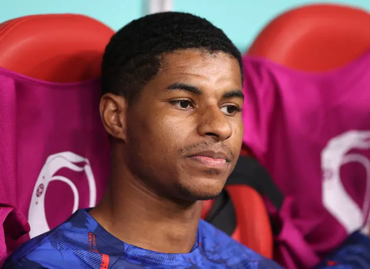 Marcus Rashford of England looks on from the subs bench during the FIFA World Cup Qatar 2022 Round of 16 match between England and Senegal at Al Bayt Stadium on December 04, 2022 in Al Khor, Qatar.