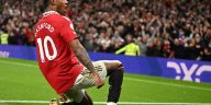 Manchester United's English striker Marcus Rashford celebrates after scoring the opening goal of the English Premier League football match between Manchester United and West Ham United at Old Trafford in Manchester, north-west England, on October 30, 2022
