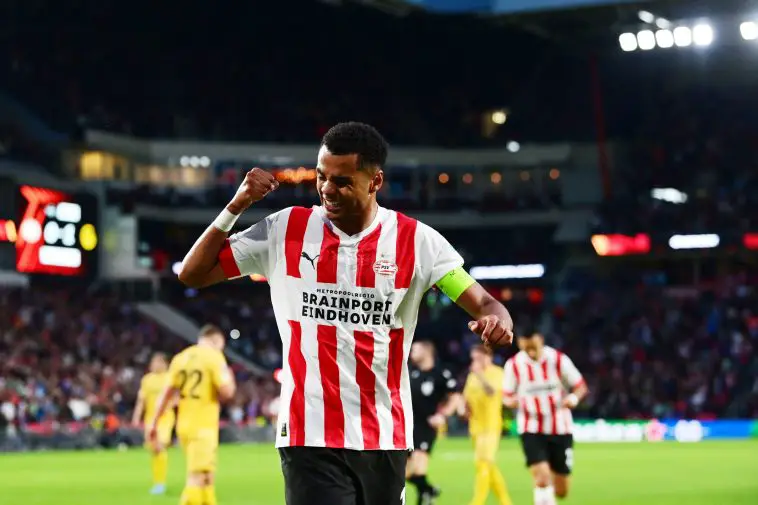 PSV's Dutch forward Cody Gakpo celebrates after scoring the 1-1 goal during the UEFA Europa League Group A first leg football match between PSV Eindhoven and FK Bodo/Glimt at Phillips Stadium in Eindhoven on September 8, 2022