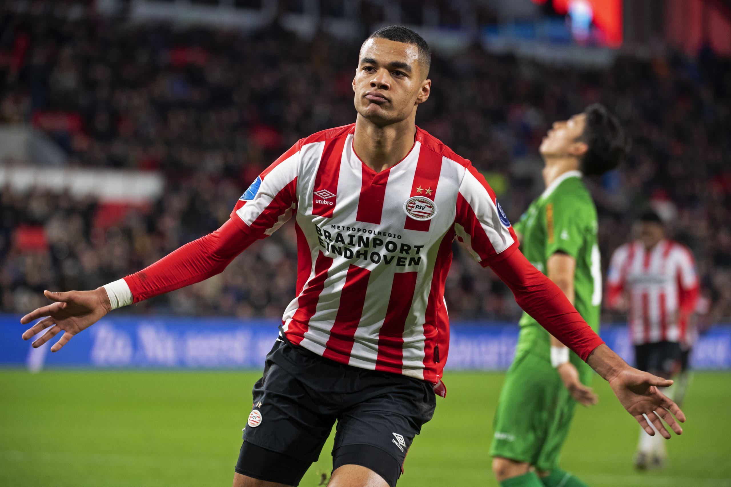 PSV Eindhoven's Cody Gakpo celebrates after scoring a goal during the Dutch Eredivisie league football match between PSV Eindhoven and PEC Zwolle at the Philips Stadium in Eindhoven, on December 21, 2019.