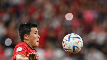 South Korea's defender #04 Kim Min-jae eyes the ball during the Qatar 2022 World Cup Group H football match between South Korea and Ghana at the Education City Stadium in Al-Rayyan, west of Doha, on November 28, 2022