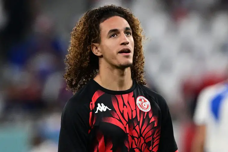 Tunisia's midfielder #08 Hannibal Mejbri warms up ahead of the Qatar 2022 World Cup Group D football match between Tunisia and France at the Education City Stadium in Al-Rayyan, west of Doha on November 30, 2022