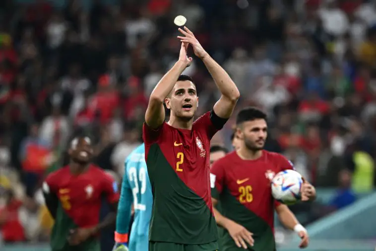 Portugal's defender Diogo Dalot applauds at the crowd after qualifying to the next round after defeating Switzerland 6-1 in the Qatar 2022 World Cup round of 16 football match between Portugal and Switzerland at Lusail Stadium in Lusail, north of Doha on December 6, 2022.