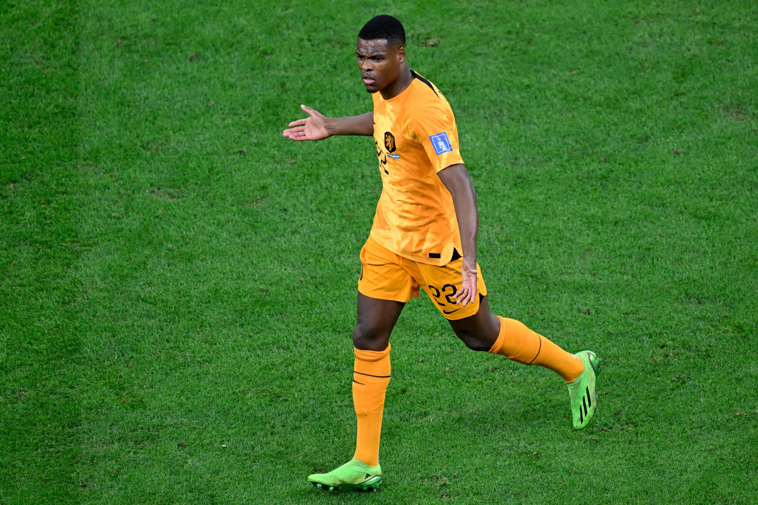 Netherlands' defender Denzel Dumfries reacts during the Qatar 2022 World Cup quarter-final football match between The Netherlands and Argentina at Lusail Stadium, north of Doha on December 9, 2022.