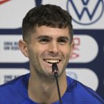 US' forward Christian Pulisic gestures during a press conference at Al Gharafa SC Stadium in Doha on December 1, 2022, during the Qatar 2022 World Cup football tournament.