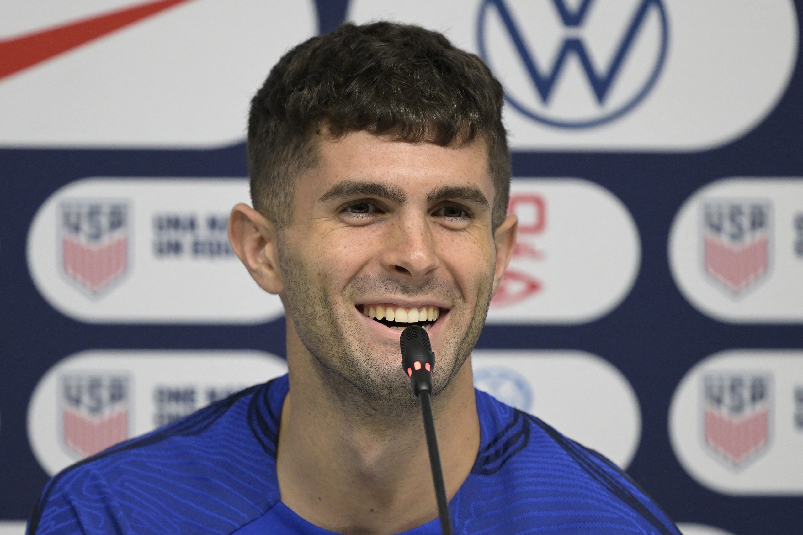 US' forward Christian Pulisic gestures during a press conference at Al Gharafa SC Stadium in Doha on December 1, 2022, during the Qatar 2022 World Cup football tournament.