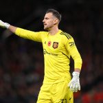 Manchester United goalkeeper Martin Dubravka organises his defence during the Carabao Cup Third Round match between Manchester United and Aston Villa at Old Trafford on November 10, 2022 in Manchester, England