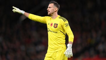 Manchester United goalkeeper Martin Dubravka organises his defence during the Carabao Cup Third Round match between Manchester United and Aston Villa at Old Trafford on November 10, 2022 in Manchester, England
