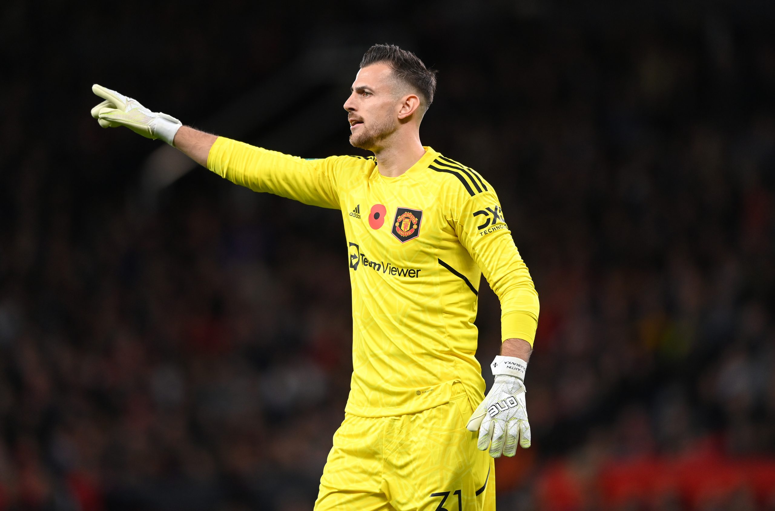 Manchester United goalkeeper Martin Dubravka organises his defence during the Carabao Cup Third Round match between Manchester United and Aston Villa at Old Trafford on November 10, 2022 in Manchester, England