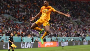 Denzel Dumfries of Netherlands celebrates after scoring the team's third goal during the FIFA World Cup Qatar 2022 Round of 16 match between Netherlands and USA at Khalifa International Stadium on December 03, 2022 in Doha, Qatar.