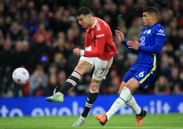 Manchester United's Portuguese striker Cristiano Ronaldo (L) shoots past Chelsea's Brazilian defender Thiago Silva (R) to score their first goal during the English Premier League football match between Manchester United and Chelsea at Old Trafford in Manchester, north west England, on April 28, 2022