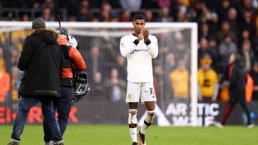 Marcus Rashford of Manchester United applauds their fans after the Premier League match between Wolverhampton Wanderers and Manchester United at Molineux on December 31, 2022 in Wolverhampton, England.