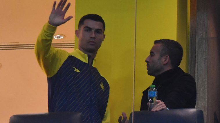 Cristiano Ronaldo in the stands at Al-Nassr's game. (Photo by -/AFP via Getty Images)