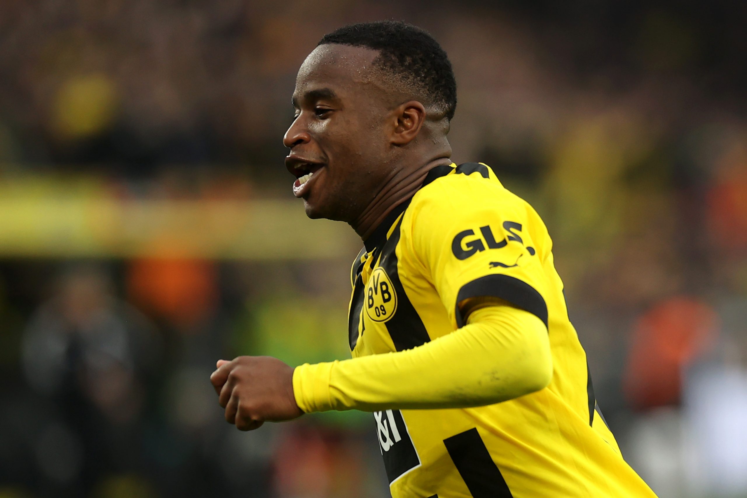 Youssoufa Moukoko considering Borussia Dortmund renewal or Barcelona move amidst Manchester United interest.