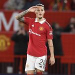 Manchester United's Brazilian midfielder Antony celebrates after scoring the opening goal of the English League Cup quarter final football match between Manchester United and Charlton Athletic, at Old Trafford, in Manchester, north-west England on January 10, 2023