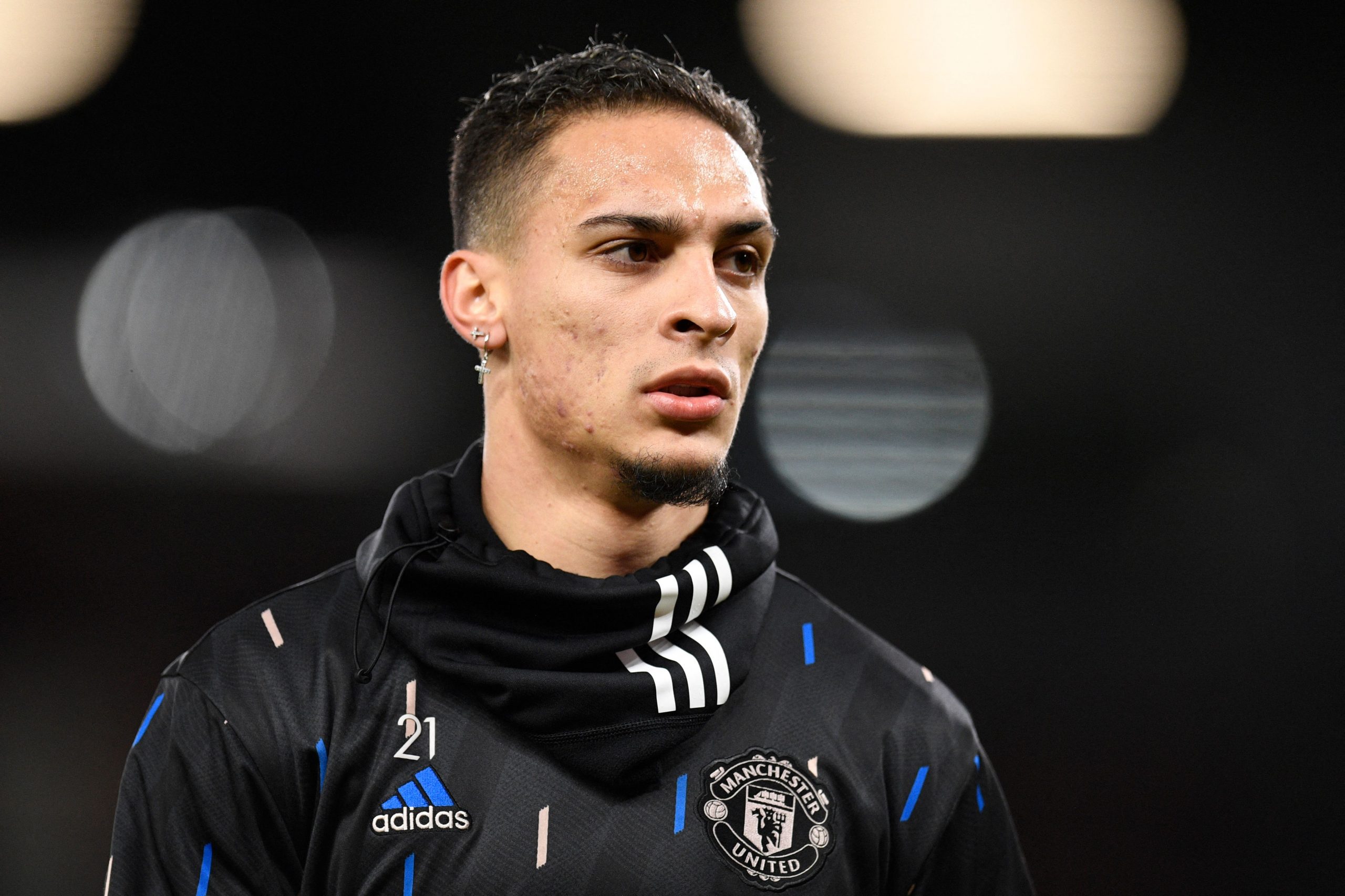 Manchester United's Brazilian midfielder Antony warms up ahead of English League Cup quarter final football match between Manchester United and Charlton Athletic, at Old Trafford, in Manchester, north-west England on January 10, 2023
