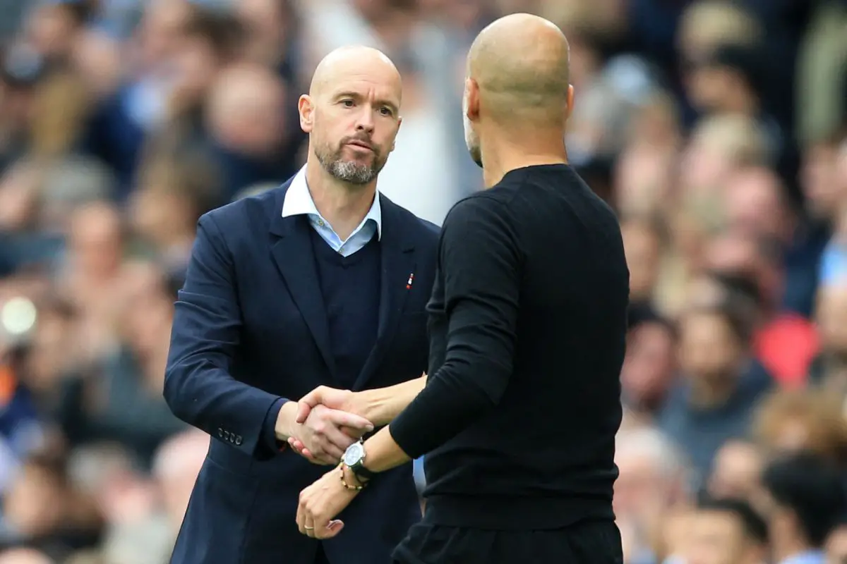 Manchester City's Spanish manager Pep Guardiola and Manchester United's Dutch manager Erik ten Hag. (Photo by LINDSEY PARNABY/AFP via Getty Images)