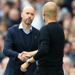 Manchester City's Spanish manager Pep Guardiola and Manchester United's Dutch manager Erik ten Hag (2R) shake hands after the English Premier League football match between Manchester City and Manchester United at the Etihad Stadium in Manchester, north west England, on October 2, 2022.