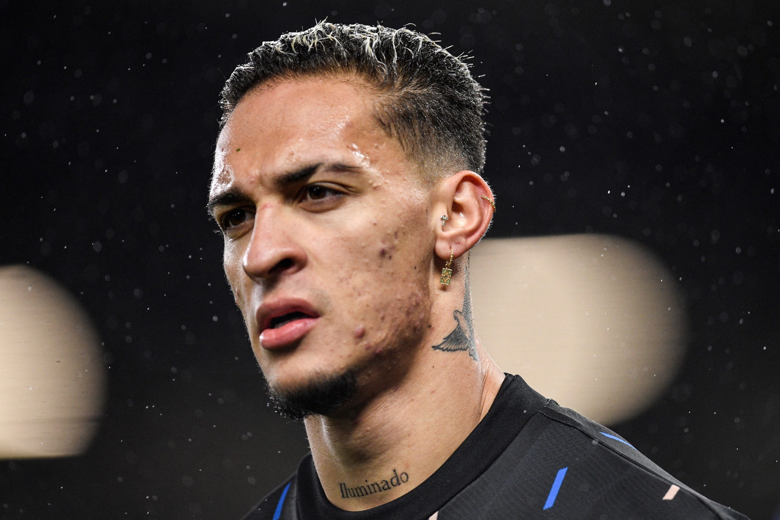 Manchester United's Brazilian midfielder Antony reacts as he warms up prior to the English Premier League football match between Manchester United and Nottingham Forest at Old Trafford in Manchester, north west England, on December 27, 2022