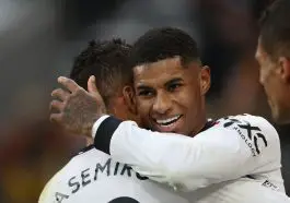 Manchester United's English striker Marcus Rashford celebrates with Manchester United's Brazilian midfielder Casemiro (L) before having his 'second goal' disallowed for handball after a VAR (Video Assistant Referee) review during the English Premier League football match between Wolverhampton Wanderers and Manchester United at the Molineux stadium in Wolverhampton, central England on December 31, 2022. - RESTRICTED TO EDITORIAL USE. No use with unauthorized audio, video, data, fixture lists, club/league logos or 'live' services. Online in-match use limited to 120 images. An additional 40 images may be used in extra time. No video emulation. Social media in-match use limited to 120 images. An additional 40 images may be used in extra time. No use in betting publications, games or single club/league/player publications. (Photo by Adrian DENNIS / AFP) / RESTRICTED TO EDITORIAL USE. No use with unauthorized audio, video, data, fixture lists, club/league logos or 'live' services. Online in-match use limited to 120 images. An additional 40 images may be used in extra time. No video emulation. Social media in-match use limited to 120 images. An additional 40 images may be used in extra time. No use in betting publications, games or single club/league/player publications. / RESTRICTED TO EDITORIAL USE. No use with unauthorized audio, video, data, fixture lists, club/league logos or 'live' services. Online in-match use limited to 120 images. An additional 40 images may be used in extra time. No video emulation. Social media in-match use limited to 120 images. An additional 40 images may be used in extra time. No use in betting publications, games or single club/league/player publications. (Photo by ADRIAN DENNIS/AFP via Getty Images)